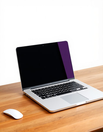 Laptop with blank screen on wooden desk isolated on white background.