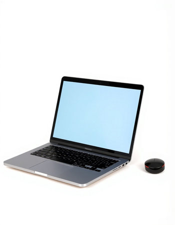 Laptop with blue screen and remote control isolated on a white background