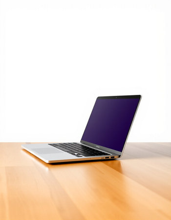 Laptop on wood table isolated on white background with clipping path.