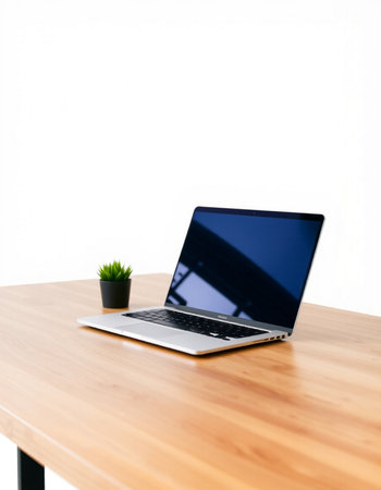 Laptop on wooden table with white wall background, Workplace concept