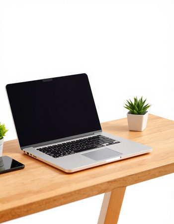 Laptop on wooden table isolated on white background. Workplace with laptop.