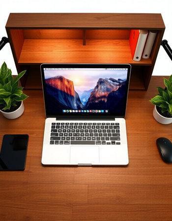 Laptop on wooden desk. 3d rendering. Computer generated image.