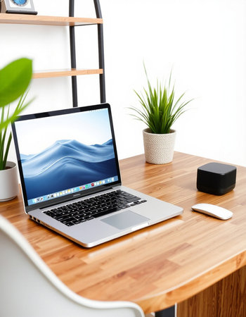 Modern workplace with laptop on wooden desk and white wall background. 3d rendering.