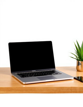 Laptop on wood table isolated on white background.