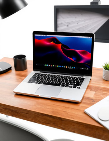 modern workspace with laptop and coffee cup on wooden table, closeupの写真素材