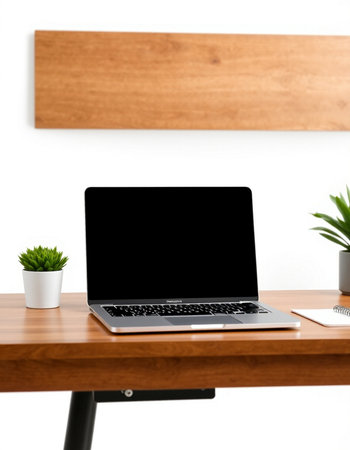 Laptop with blank screen on wooden desk in office. Mock up