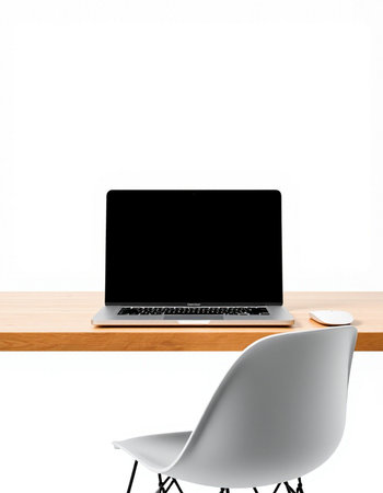 Laptop with blank screen on a wooden desk isolated on white background