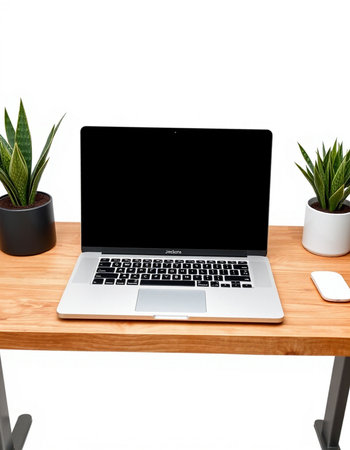 Modern workplace with blank screen laptop on wooden tableの写真素材