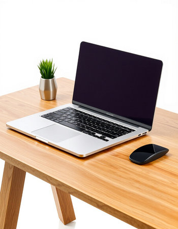 Laptop on wooden desk isolated on white background with clipping path.
