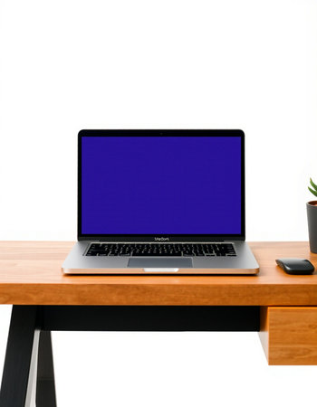 Laptop computer with blank screen on wooden table isolated on white backgroundの写真素材