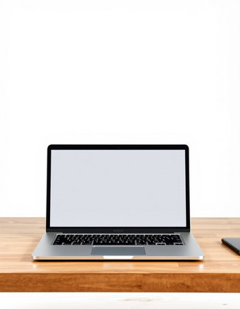 Laptop computer with blank screen on wood table isolated on white background