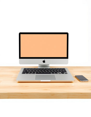 Computer with blank screen on wooden table isolated on white background
