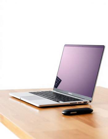 Laptop on a wooden table with white background