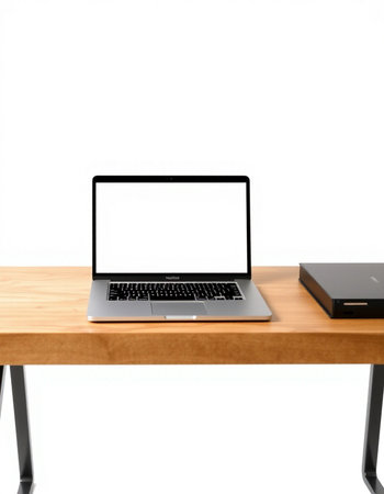 Laptop computer on wooden table isolated on white background with clipping path