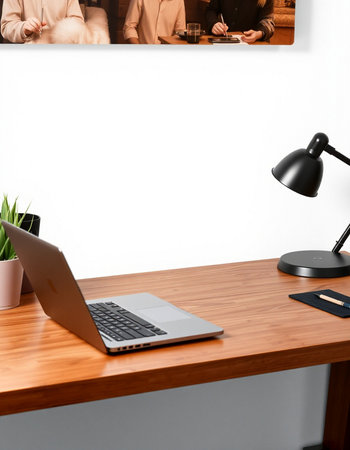 Workplace with laptop on wooden table in modern office, closeupの写真素材