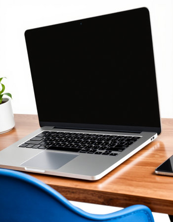 Laptop with blank screen on wooden table in office, closeupの写真素材