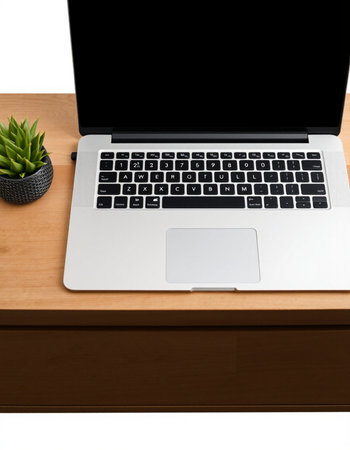 Laptop on wooden table with blank screen