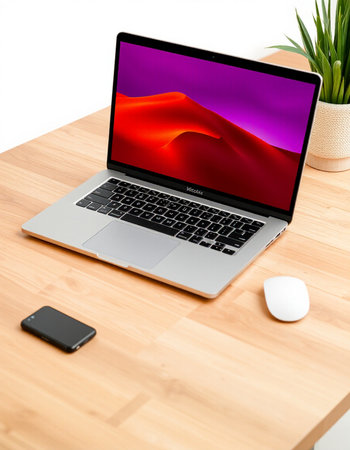 Laptop on wooden desk.