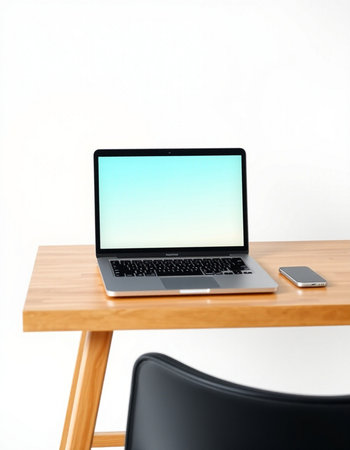 Laptop on wooden table and chair on white background, stock photoの写真素材