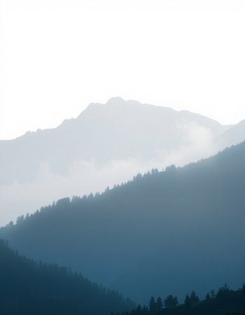 mountain landscape in the morning with fog and sunbeams.