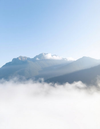 Mountain landscape with clouds and blue sky. Caucasus Mountains, Georgia.の写真素材