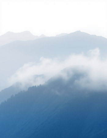 Mountain landscape with fog in the morning. Caucasus Mountains, Georgia.