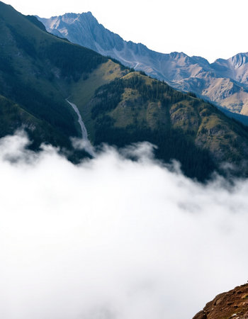 Beautiful mountain landscape with fog and clouds in Caucasus mountains, Georgiaの写真素材