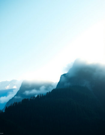 Mountain landscape with fog in the morning. Caucasus Mountains, Georgia.