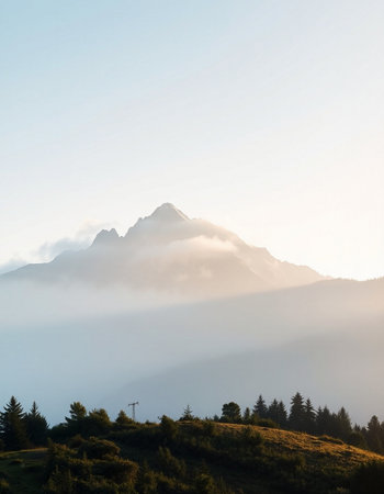 Beautiful mountain landscape with fog in the alps.