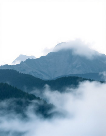 Mountain landscape with fog and clouds.