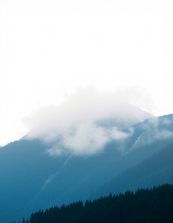 Mountains in the mist on a summer day. Siberia, Russia