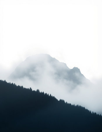 Silhouette of the mountains with fog in the morning, Switzerlandの写真素材