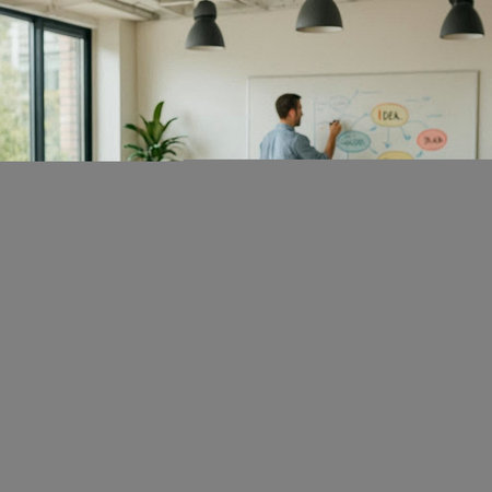 Side view of young businesswoman writing on whiteboard while standing in office