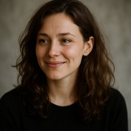 Portrait of a young woman with freckles and brown hair