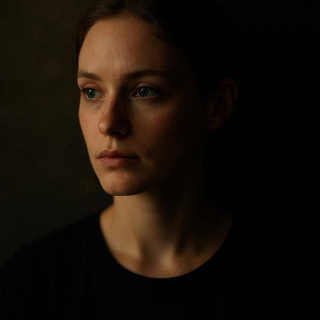 Portrait of a beautiful woman in a black T-shirt.