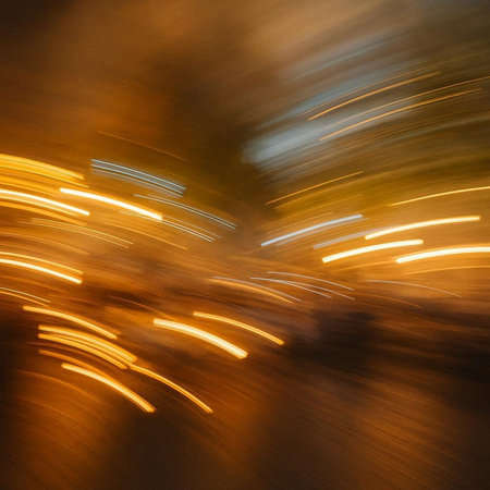 Abstract motion blur of car in city at night. Long exposure.