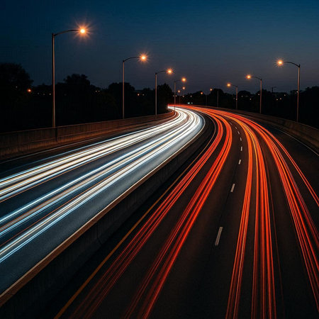 Car light trails on the road at night. Long exposure photo.