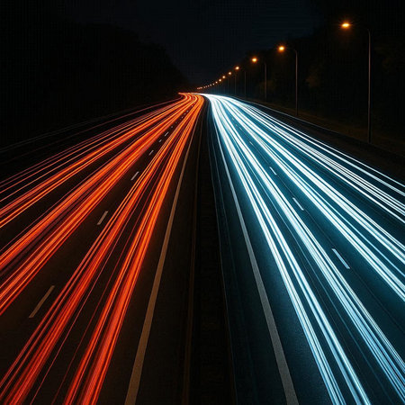 Car light trails on the road at night. Long exposure photo.