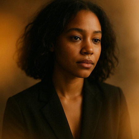 Portrait of a young african american woman in a black suit