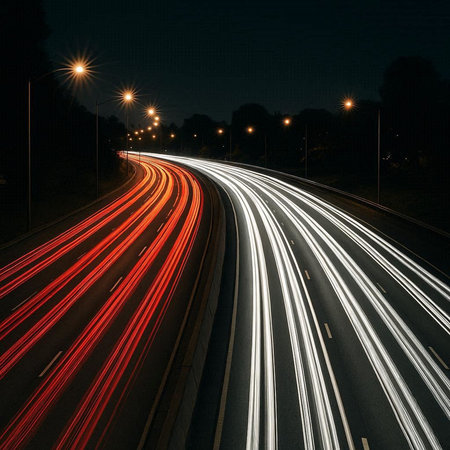 Car light trails on the road at night. Concept of speed and motion.