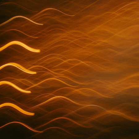 abstract background with long exposure of light trails in the dark.