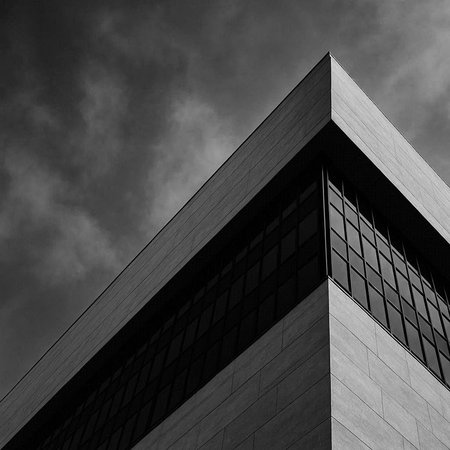Black and white view of modern office building. Abstract architecture background.