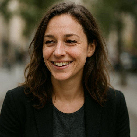 Portrait of a smiling young woman looking at the camera. Close up.