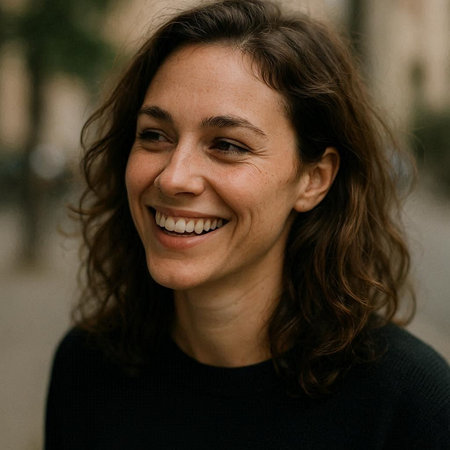 Portrait of a beautiful young woman smiling and looking at the camera.