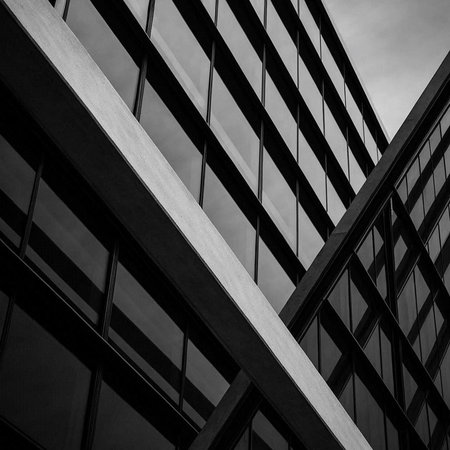 Modern office building detail. Black and white. Abstract architectural background.