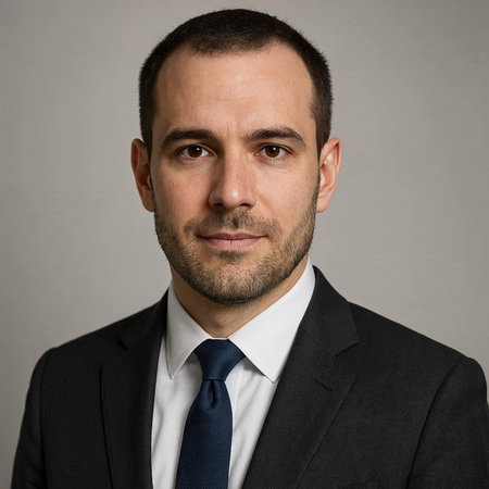 Portrait of a young business man wearing a suit and tie.