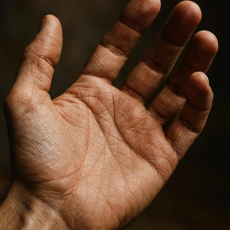 Close up of a man's hand showing the palm of his hand