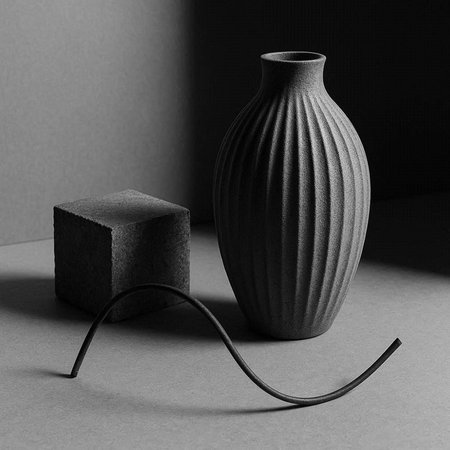Modern black vase on gray background. Minimalistic still life