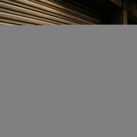 Wooden door with blinds in the old train station, stock photo