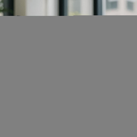 Close-up portrait of a businesswoman standing in the office.